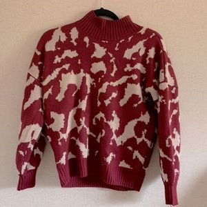 Red and gold sweater